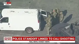 Second white van approached in search for California shooting suspect