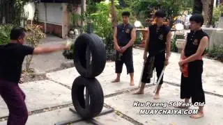 Thai Sword Training Hitting The Tire ฝึกตีเป้ายาง