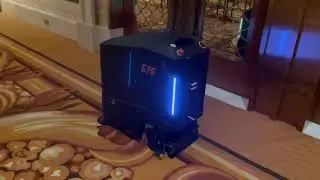 Kokobots S76 Cleaning Carpet in a Large Event Hall