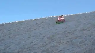 Gary & Diana slide on sand