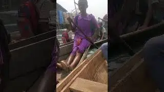Students On Canoe in the Slum