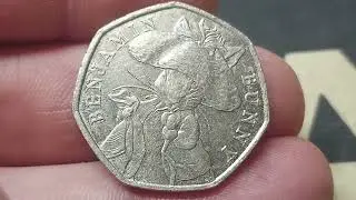 25000000 BENJAMIN BUNNY 50 PENCE COIN VALUE