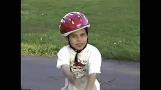 2002 Easter Danny on 4th street, Kyle learning to ride a bike & IJN Spring Concert