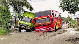 Chaotic Situation Coal Truck Sinks and Nearly Tips Over, Bus Bumper Scrapes on a Pothole-Ridden Road