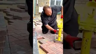 Brick paving process using a manual cutter