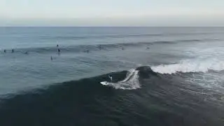 Young surfer in Cokes Surf Point, Thulusdhoo, Maldives.