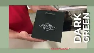 Custom printed matte laminated dark green bags with rope handles.  Printed in the USA.