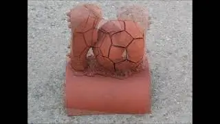 Half round ridge tile football roof finials