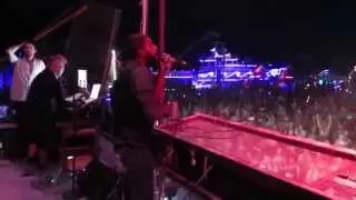 Ras Puma singing with Thievery Corporation as they perform at Burning Man 2014