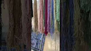Boys weaving carpets in Egypt.