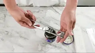 Innovative adjustable stainless steel can opener.