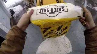 Hooking up the 110 TLB loader mount salt spreader and spreading salt
