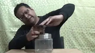 Photoelectric effect Demonstration. Glass acquired positive charge on rubbing with fur.