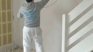 Spraying ceiling with Graco GX21