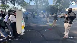 Protesters throw paint at ICE agents in Tucson