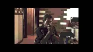 Steven "Smiley" Baker.  Enjoy some fine harmonica from a man who lived up to his nick name.