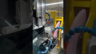 Syst&egrave;me de chargement automatique avec entra&icirc;nement de la pi&egrave;ce par plateau magn&eacute;tique .