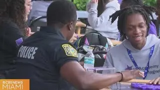 North Miami Beach high school resource officer brings students together with dominoes club