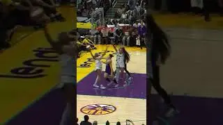 Angel Reese blocks Li Yueru and gathers the ball