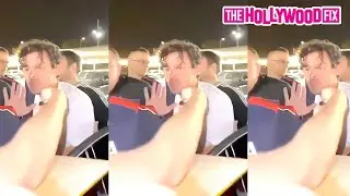 Harry Styles Is Mobbed By Overly Aggressive Fans While Arriving At The Airport In Barcelona, Spain