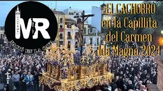 El Cachorro por la Capillita del Carmen del Puente de Triana a la ida de la Magna de 2024.