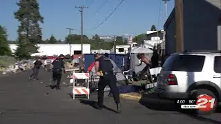 City of Bend begins Emerson Avenue homeless camp removal as protesters look on