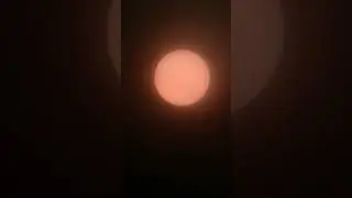 sunrise and it's sunspot on my mobile telescope