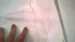 Met stucwerk scheur herstellen wapeningsnet
