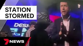 Ecuadorian TV station broadcasts takeover by men armed with guns and explosives | 7 News Australia