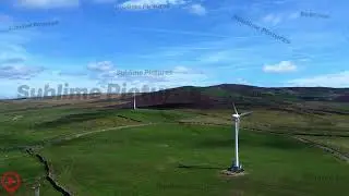 Two Welsh wind turbines, descending