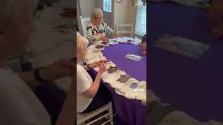 Angels praying over angel gowns.