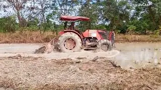 Watch  Powerful Tractor Kubota M6040SU Plowing Soil Fast!