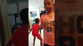 Ziqry and Zefre showing football skills