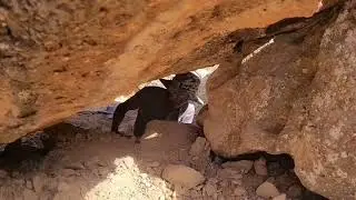Survival in the mountains; building a safe shelter under a big rock, cooking in the fireplace