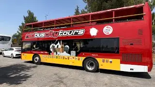 Red bus. Jerusalem. Tour to the eastern part of the city. 1 August 2023