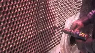 Condenser Retubing - Brushing Tubesheet Holes