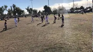Ahmer Loabneh dribbling between defenders attempting to score RSL tournament March 2019