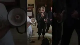 Jeremy Irons talks to striking security officers at the University of London 2