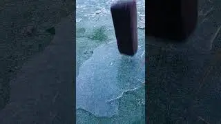 Slow Motion Rock Falling On Ice 3