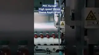 PDC Europe's R-series High-speed Shrink Sleeve Applicator #shrinksleeves #beverageindustry #machine