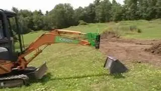 Turn Your Mini Excavator into a “True” Tool-Carrier with the XBoom Coupler System!