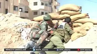 Syrian government forces fight Kurdish militias over Hasakah