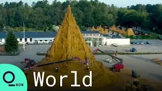 World's Tallest Sandcastle Topped With Covid Crown in Northern Denmark
