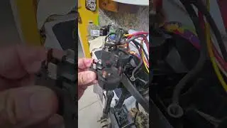 Replacing the control speed switch in an electric boat motor.