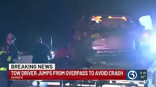 Tow truck driver jumps off overpass to avoid accident