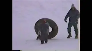 Family Inner Tubing in the Snow 1995