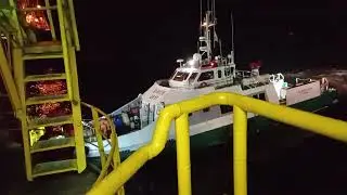 Night Surfer boat pax transfer at Atlantic Ocean 