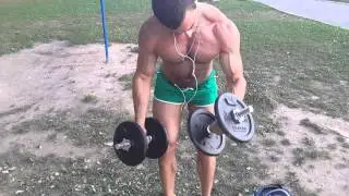 21 year old Bodybuilder flexing biceps