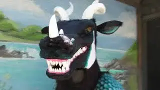 Dragon costume with snarling lip and animated eyes - Must be 18 or older to order