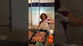 Sampling fresh prawns at the market in Port Ajaccio, Corsica